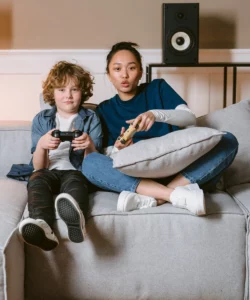 Brother and sister playing video games
