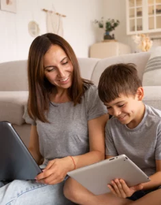 Mom and son each using their tablets