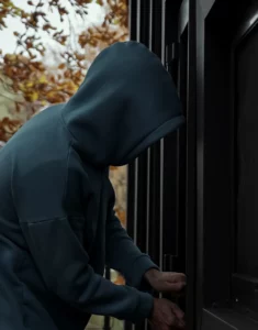 Person attempting to break into a home